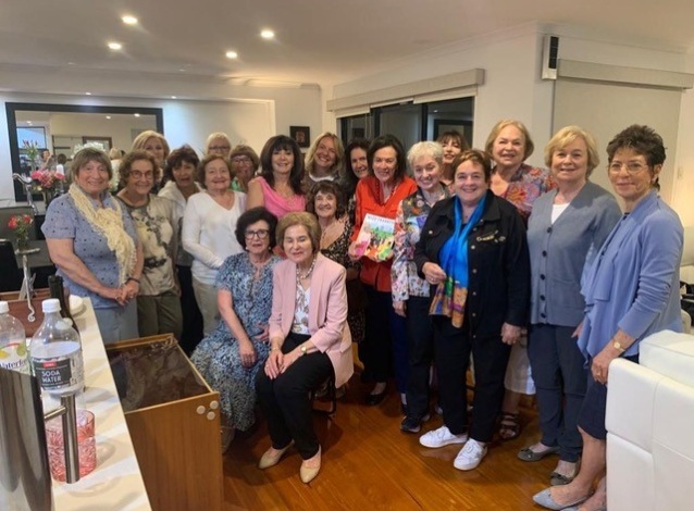 Group of older women gathered together in a room