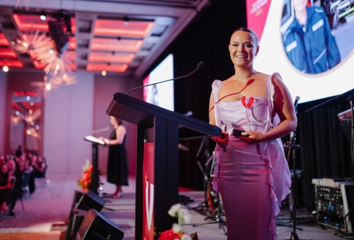 2025 WA Young Volunteer of the Year Recipient, Bree Del Borrello, at the podium with her trophy