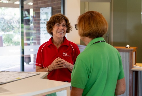 Volunteer WA's Member Engagement Manager speaking to a volunteer
